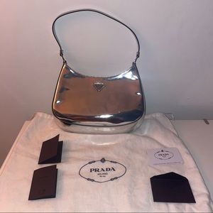 Prada brushes leather Cleo bag in silver- pre owned with authentication.